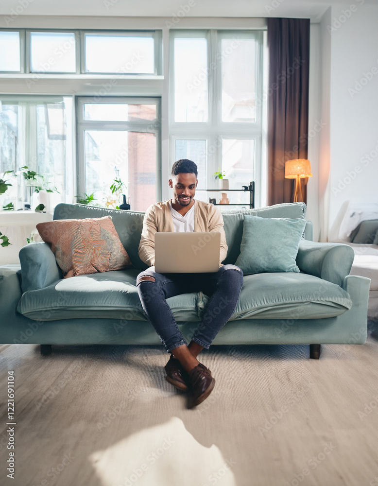 A content professional works remotely from a modern living room, sitting comfortably on a mint green couch while using a laptop in natural light. Generative AI A content professional works remotely from a modern living room, sitting comfortably on a mint green couch while using a laptop in natural light. Generative AI