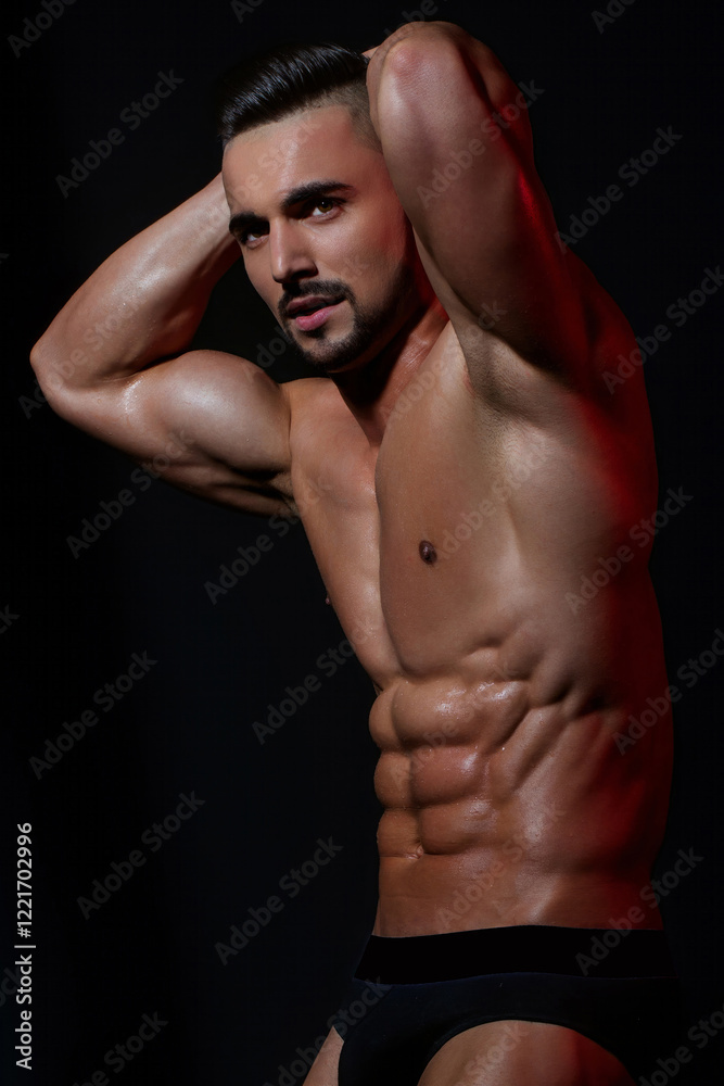 Handsome muscular man. Sexy body of fit male sexy model. Beauty man with perfect muscular body. Hot naked young middle eastern guy enjoying his muscular body. Shirtless, portrait and sexy man.