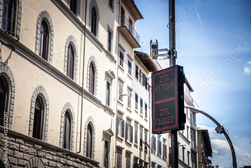 Digital sign in Florence Italy for a ZTL closure (Zona a Traffico Limitato, Limited traffic zone), restricting vehicle access in historic district to protect air quality, reduce congestion & pollution