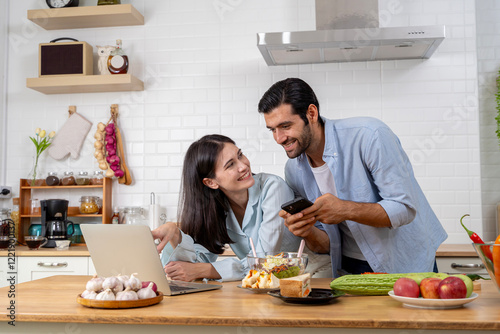 Tableau sur toile Happy excited young Caucasian couple feel euphoric with good email, get amazing sale offer or discount deal on computer