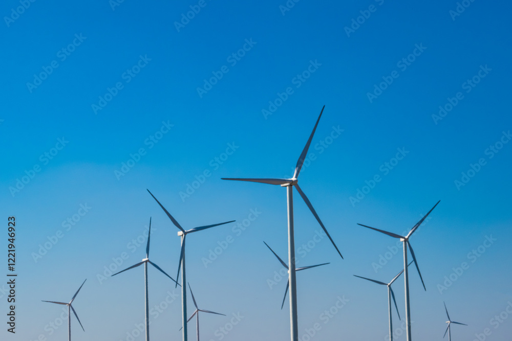 Wind farm on the mountain on blue sky day wind energy concept alternative energy Renewable energy Wind farm on the mountain on blue sky day wind energy concept alternative energy Renewable energy