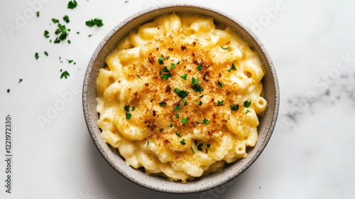 A bowl of creamy mac and cheese with a golden, crispy top and a sprinkle of fresh parsley, Centered in a minimalist ceramic bowl