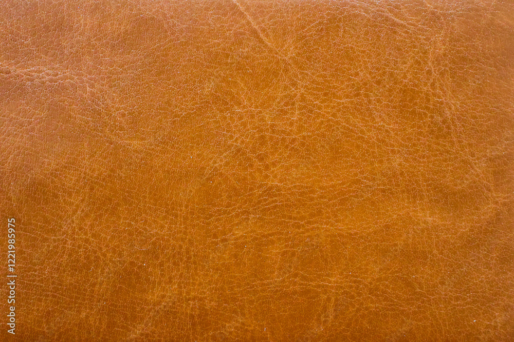 Brown or orange textured leather background. Abstract leather texture. Brown or orange textured leather background. Abstract leather texture.