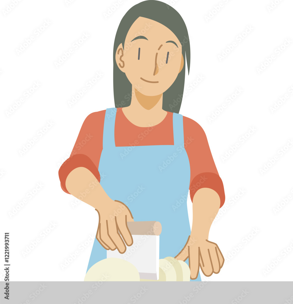 パン生地をスケッパーで切り分ける女性