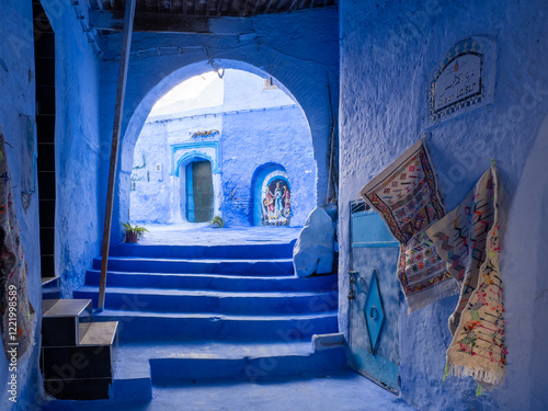 Chefchaouen,  the blue city in Morocco - doorways through an arch with steps