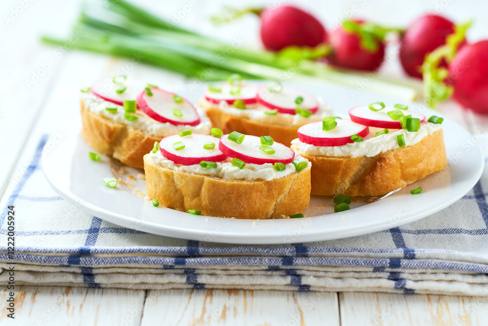 Light healthy diet snacks with crispy baguette , soft cheese and freshly gathered organic radishes and chives. Light healthy diet snacks with crispy baguette , soft cheese and freshly gathered organic radishes and chives.