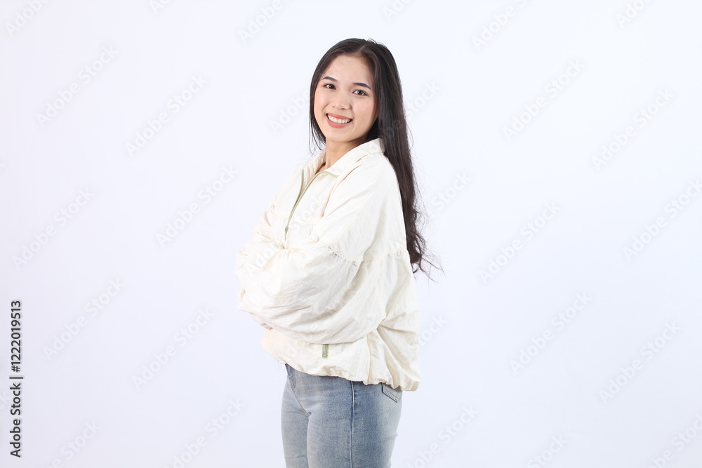 Woman Smiles with Arms Crossed in Stylish Outfit on White Background, Confident Pose, Fashion, Style, Lifestyle Woman Smiles with Arms Crossed in Stylish Outfit on White Background, Confident Pose, Fashion, Style, Lifestyle