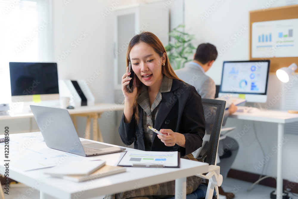 Businesswoman Engaging in Productive Office Work Businesswoman Engaging in Productive Office Work