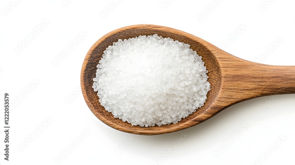 Wooden spoon filled with coarse white salt Wooden spoon filled with coarse white salt