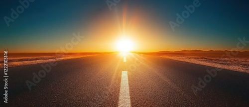 A straight road leading to the horizon with dramatic lighting and an empty landscape, symbolizing a journey or business growth.