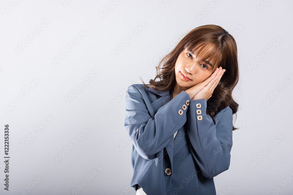 Portrait Asian beautiful young business woman pretended emotions sleeping tired eyes closed dreaming with hands together near face, studio shot on white background, insomnia concept, copy space Portrait Asian beautiful young business woman pretended emotions sleeping tired eyes closed dreaming with hands together near face, studio shot on white background, insomnia concept, copy space
