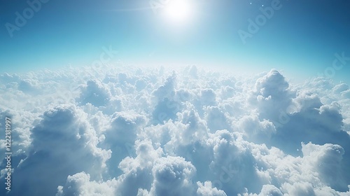 arafly view of a bright sun shining over a cloud filled sky photo