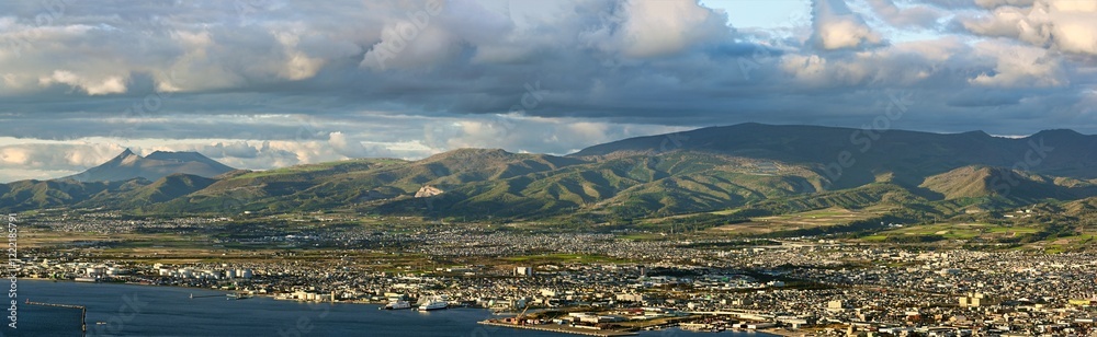 Panoramic view of Hakodate City from the observation deck on top of Mt. Hakodate. In the evening, the city and mountains in the background are beautifully golden.