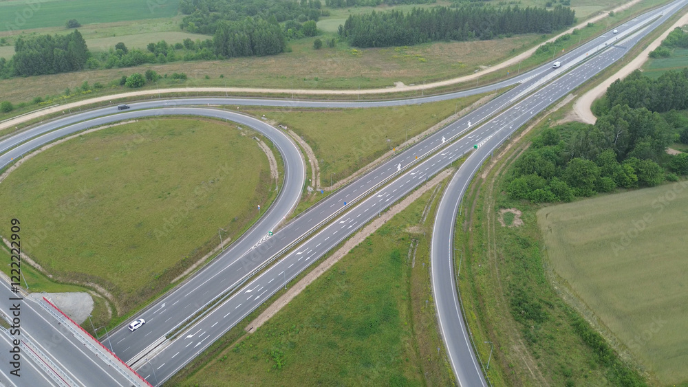 Aerial photo of highway intersection surrounded by farmland Aerial photo of highway intersection surrounded by farmland