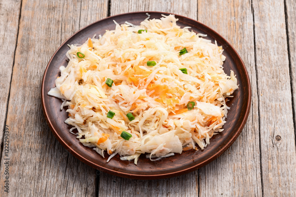 Tasty marinated cabbage with carrot, healthy food Sauerkraut photography . Top view Tasty marinated cabbage with carrot, healthy food Sauerkraut photography . Top view