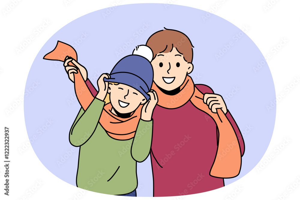 Little boys in winter hats and scarves rejoicing at onset of winter and preparing for walk in park. Boys brothers or friends having fun enjoying communication and coming of december holidays Little boys in winter hats and scarves rejoicing at onset of winter and preparing for walk in park. Boys brothers or friends having fun enjoying communication and coming of december holidays
