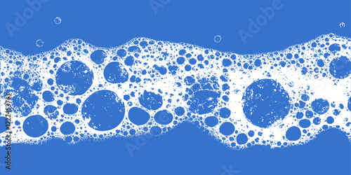 Soap foam texture with blue background and grunge abstract pattern. Water wash bath with soapy bubbles, glass.