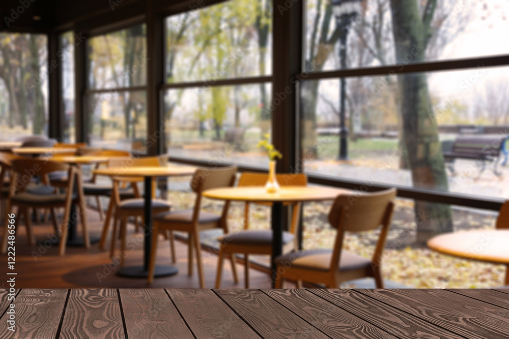 Fototapeta premium Empty wooden table in restaurant, space for design