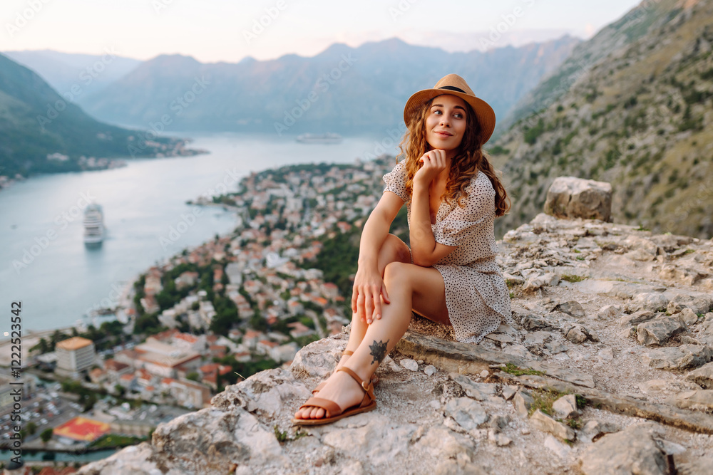 Beautiful female tourist enjoys the view of the city. Europe travel. Lifestyle, vacation, weekend. Beautiful female tourist enjoys the view of the city. Europe travel. Lifestyle, vacation, weekend.
