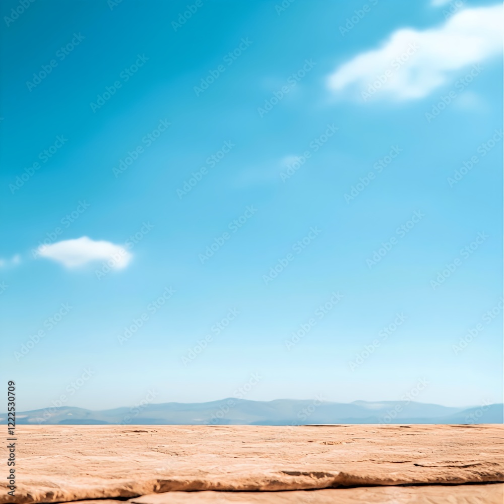 Fototapeta premium Vibrant Blue Sky over Golden Brown Landscape with Cloud Puffs