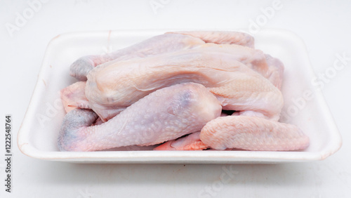 Raw carcass chicken, ayam kampung in Indonesia isolated on white