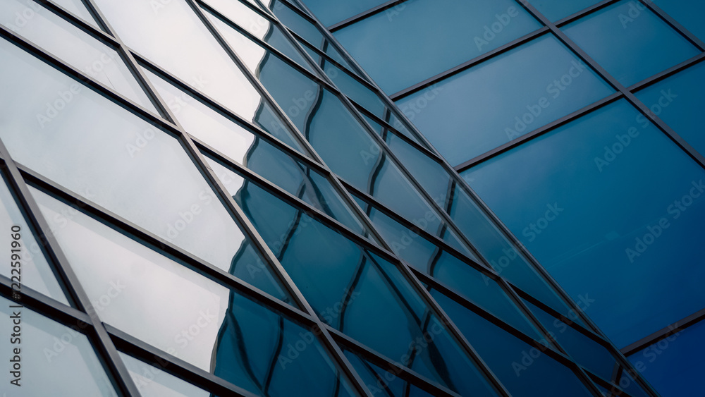 reflection with distortion in the window of a modern tall building reflection with distortion in the window of a modern tall building