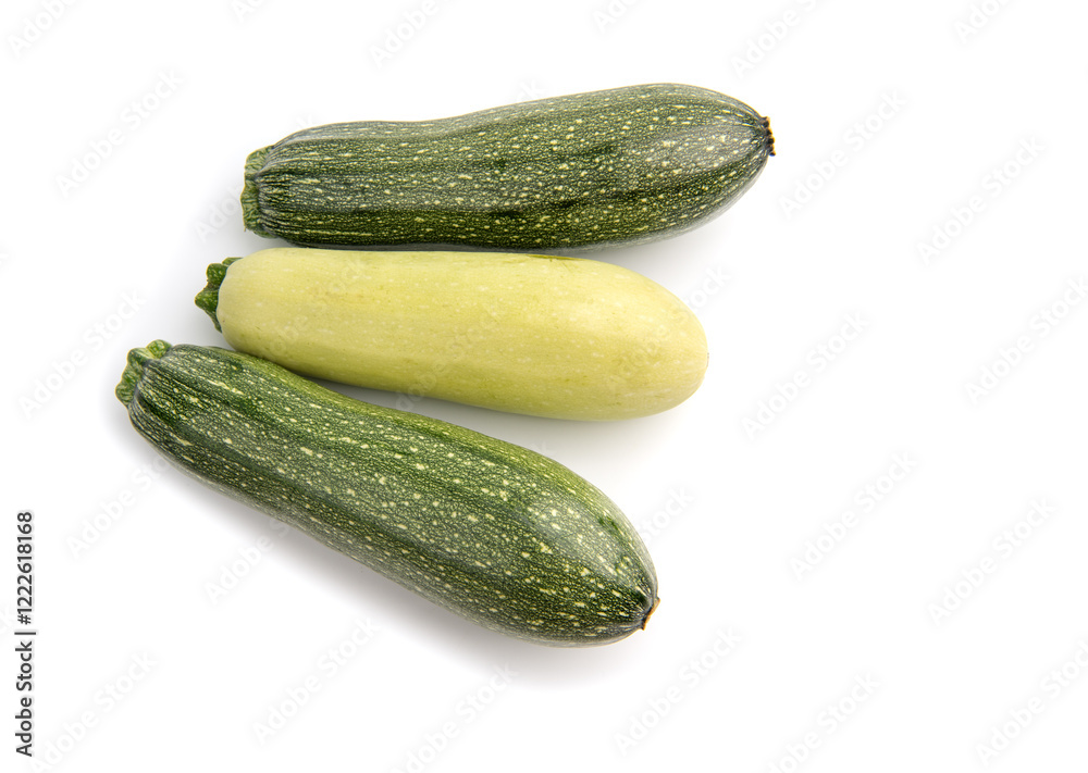 green zucchini vegetables isolated on white.