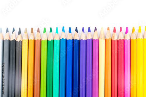 Colourful wooden colored pencils isolated on white background with copy space