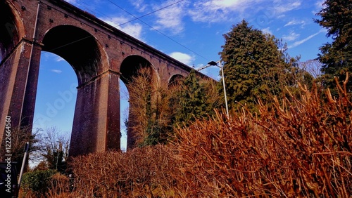 old stone bridge viaduct in autumn