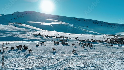 Wallpaper Mural Almaty, Kazakhstan - JANUARY 11 2025: People skiing on a snowy slope, mass winter holidays, People skiing Torontodigital.ca