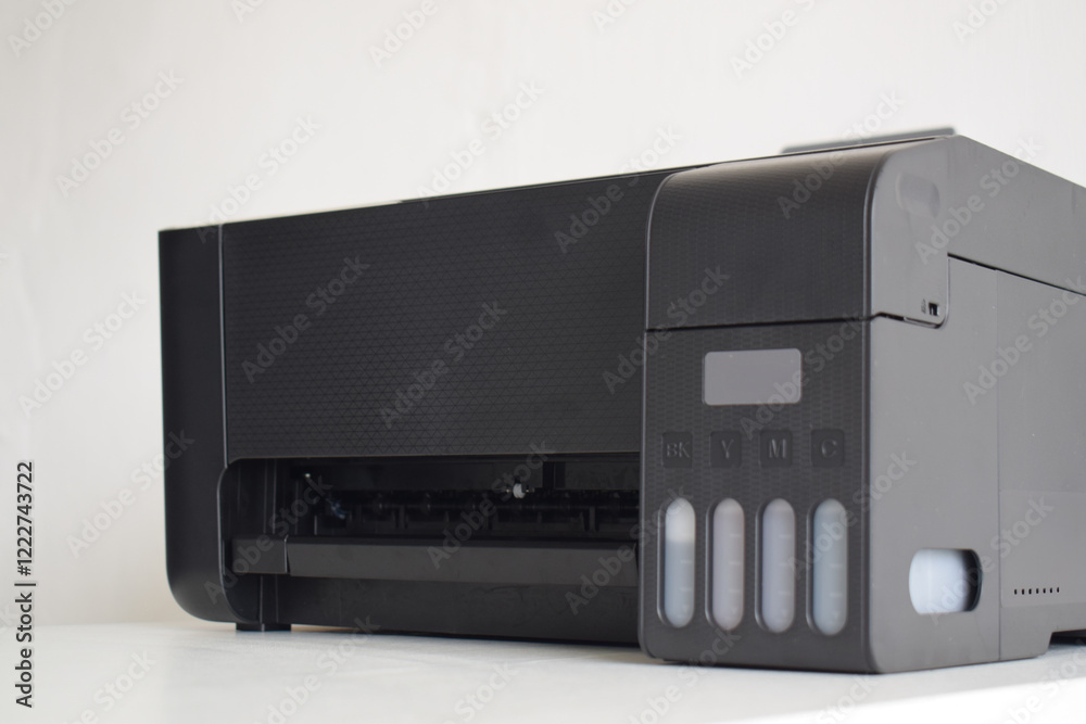 Obraz premium Printer, copier, scanner on white table with white background