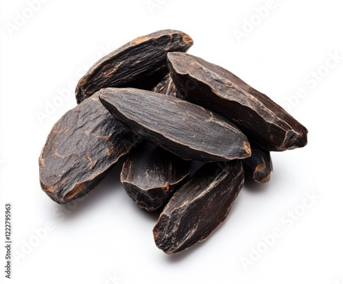 Wallpaper Mural Exotic tonka beans arranged on a white background highlighting their unique shape and dark color Torontodigital.ca