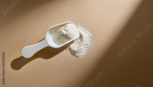 Scoop of white powder. Hydrolyzed collagen. Sodium Benzoate, Citric Acid, Calcium Carbonate, Pectin photo