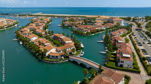 Aerial view of the marina of Policoro, in Basilicata, Italy. A small village with luxurious villas built between the canals. photo