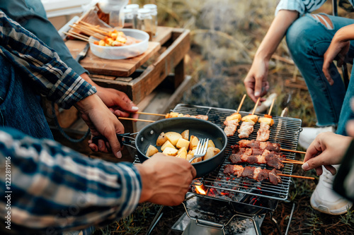 Close-up cooking in a camping setting. photo