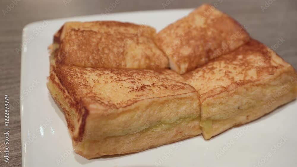 Egg toast with kaya butter on the plate