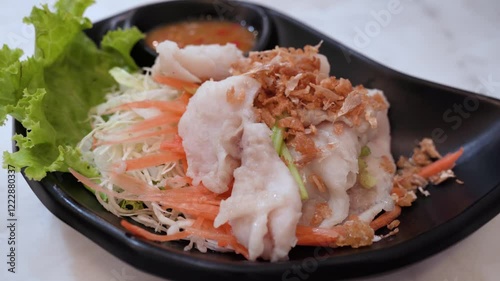 Boil fish slices with spicy dip.