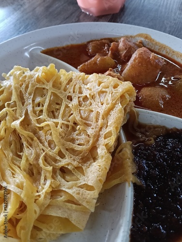 Roti jala is a favorite food in Malaysia originating from Johor, also found in ASEAN countries such as the Malay Peninsula, Riau Islands and Sumatra