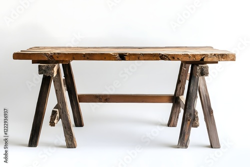 Primitive Wooden Table with Mismatched Wood and Sawhorses Against White Background
