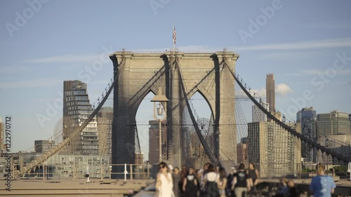 A detailed view of the Brooklyn Bridge Close-Up with Pedestrians, New York photo