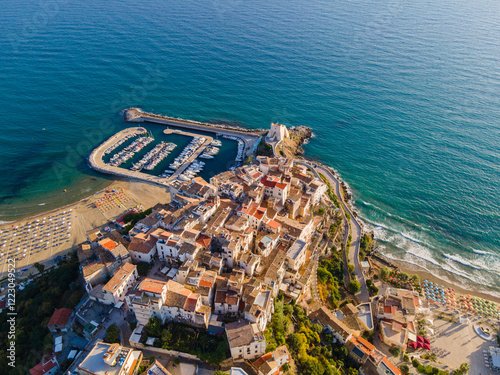 Fototapeta Naklejka Na Ścianę i Meble -  View from the aircraft to the coastline, beaches, seaport and the architecture of the city