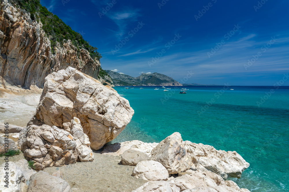 Φωτογραφία Rocks at Cala Luna beach and clear transparent blue water in the Gulf of Orosei,