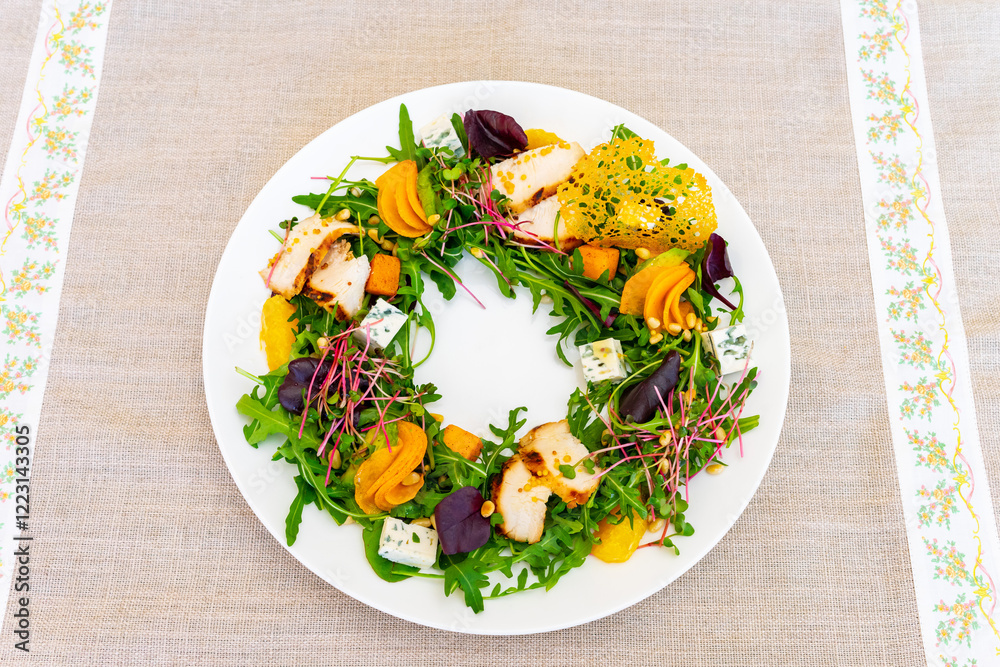 Fresh salad with vibrant vegetables and edible flowers arranged creatively Fresh salad with vibrant vegetables and edible flowers arranged creatively