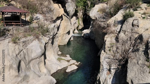 Passing through the Dokuzoluk Recreation Area in the Karaisali district of Adana province, the mesmerizing and tranquil view of Eglence River provides a restful sight perfect for a weekend activity. photo