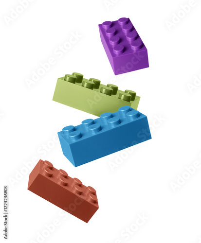 Plastic blocks bricks close up in the air isolated on a white background