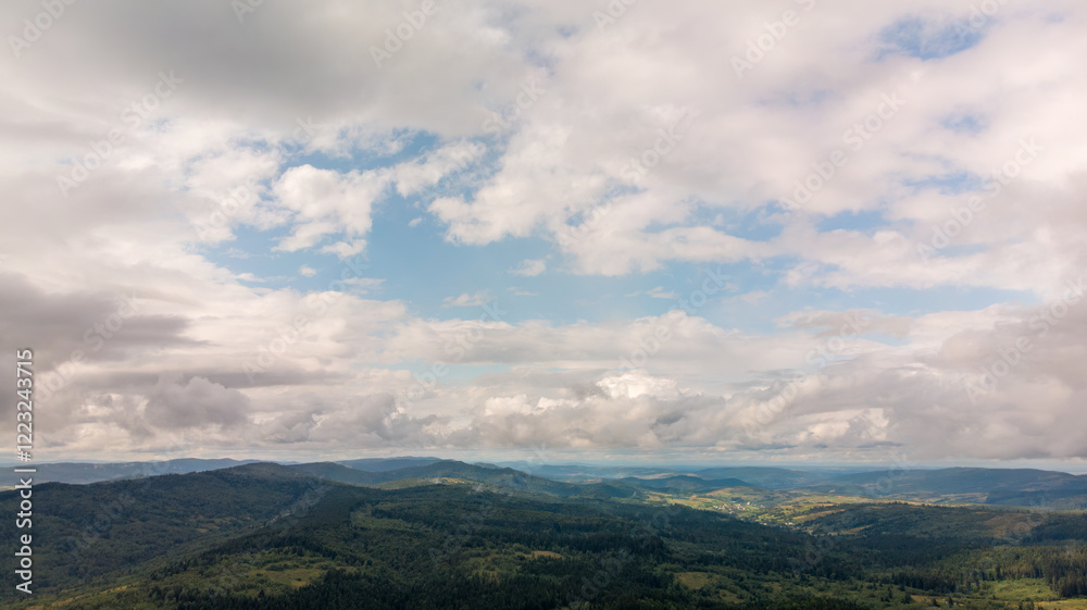 Majestic Mountains, Lush Green Forests, And Soft White Clouds On A Sunny Day. Aerial View Showcasing The Stunning Beauty Of Nature From A High Perspective. Majestic Mountains, Lush Green Forests, And Soft White Clouds On A Sunny Day. Aerial View Showcasing The Stunning Beauty Of Nature From A High Perspective.
