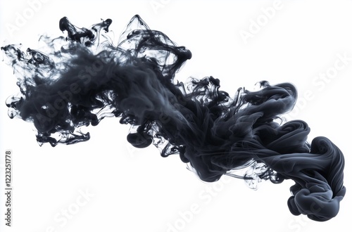 Elegant black ink gracefully swirls and drifts in clear water against a bright white background photo