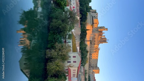 The Orb river with the Cathedral of Saint Nazaire in Beziers, Southern France.  photo