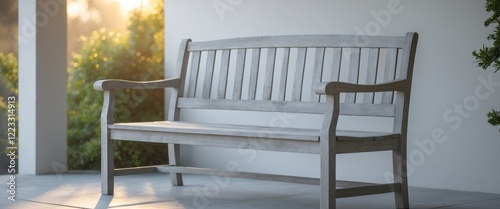 Wooden bench inviting relaxation on a modern porch photo