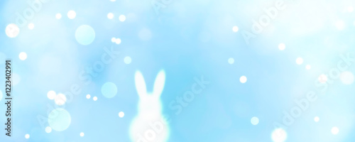Easter bunny with blurred bokeh lights - spring background panorama greeting card - Season decoration banner